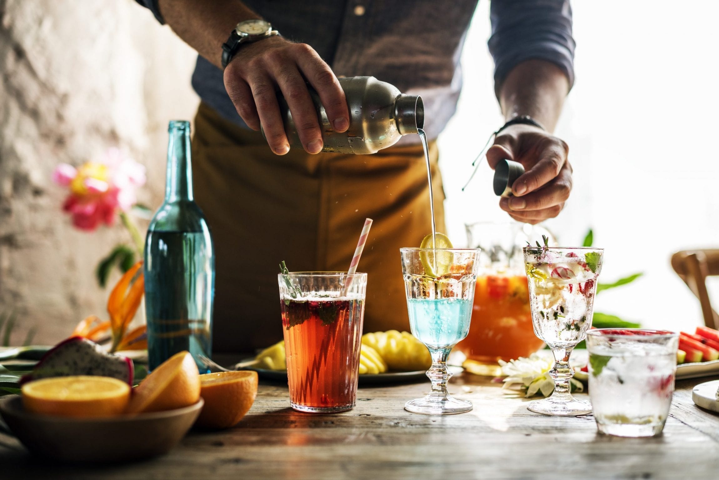 Spirit of Wales Distillery Welsh cocktails for the weekend Bartender mixing colorful cocktails